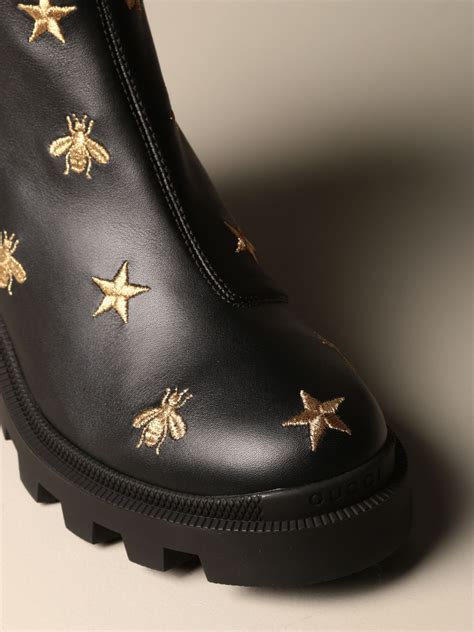 Gucci black boots with bees